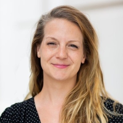 Rachel Schott, head and shoulders portrait, smiling